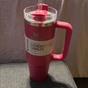 Stanley Pink Travel Mug with Clear Lid and Ergonomic Handle